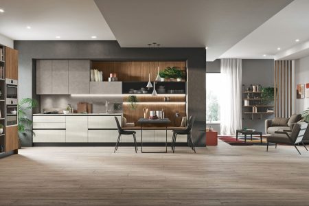 Cuisine en bois et blanc avec plan de travail en pierre dans un espace ouvert, aménagement sur mesure alliant matériaux naturels, luminosité et design contemporain