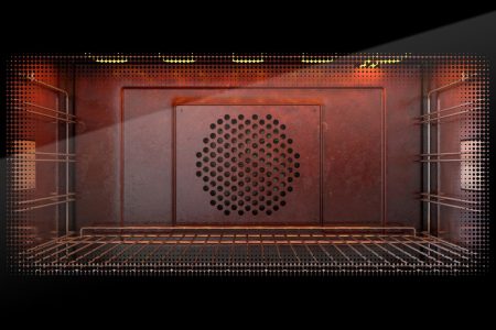 Four à pyrolyse intégré dans une cuisine, électroménager moderne facilitant le nettoyage automatique et offrant performance et praticité